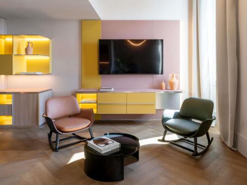 Suite Privilege con vistas a la bahía del hotel Palazzo Tirso Cagliari Mgallery. Foto 1