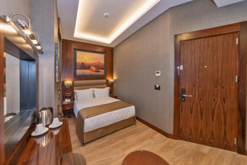 Habitación Individual Deluxe del hotel Piya Sport. Foto 3