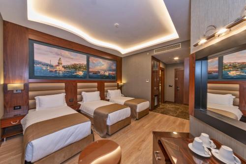 Habitación Triple Deluxe del hotel Piya Sport. Foto 4