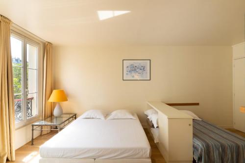 Apartamento Con Cocina Vista ciudad 2 sofás camas del hotel Capfun Le Saint Germain