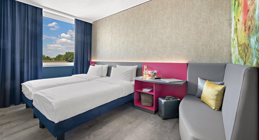 Habitación con dos camas individuales del hotel Hey Lou Nördlingen