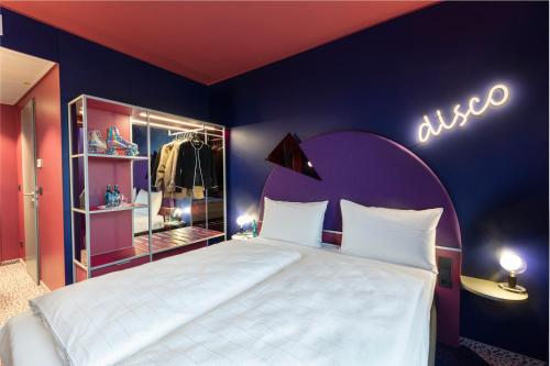 Habitación Doble Comunicada del hotel Ibis Styles Muenchen Perlach. Foto 11