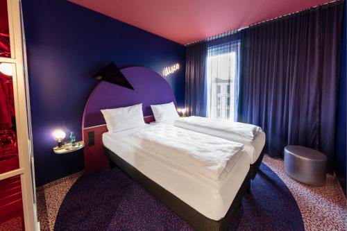 Habitación Doble Comunicada del hotel Ibis Styles Muenchen Perlach. Foto 13