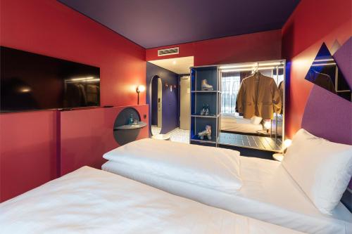 Habitación Doble Estándar - 2 camas del hotel Ibis Styles Muenchen Perlach. Foto 9