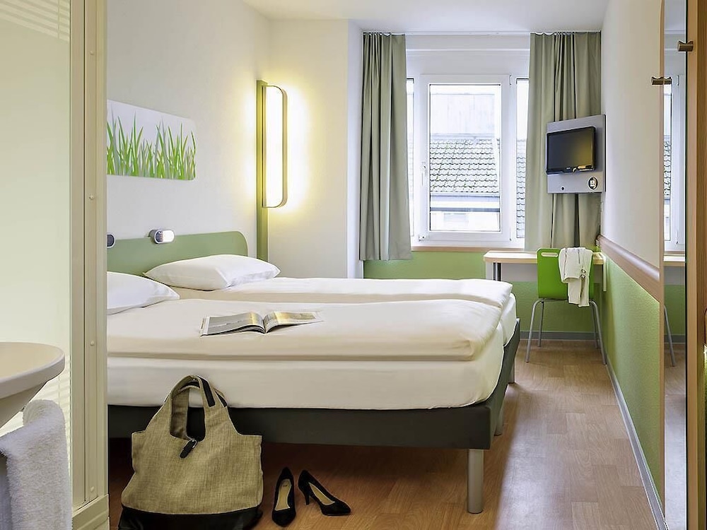 Habitación Doble con dos camas individuales del hotel ibis budget Aachen City. Foto 3