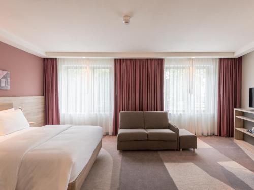 Habitación con cama grande - Adaptada para personas con movilidad reducida - No fumadores del hotel Hampton By Hilton Frankfurt City Centre East. Foto 4