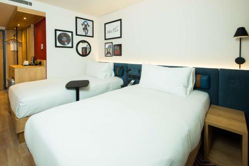 Habitación con sofá cama - 1 cama grande del hotel Hampton by Hilton London Park Royal. Foto 1