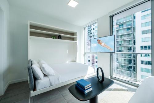 Estudio - 1 cama grande y 2 literas del hotel Yotel Miami. Foto 4