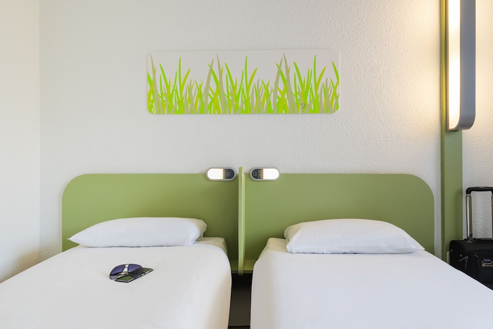 Habitación Smart con 2 camas individuales del hotel Ibis Budget Chalon Sur Saone Nord. Foto 2