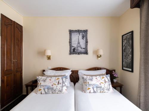 Habitación Doble Pequeña - 2 camas del hotel Minerve Paris. Foto 3