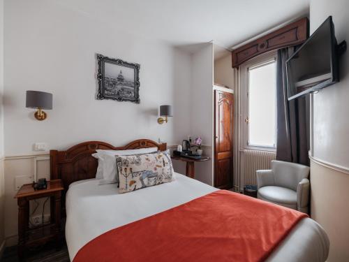 Habitación Individual Pequeña del hotel Minerve Paris. Foto 1