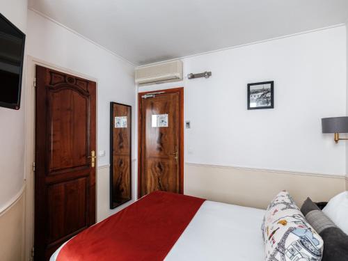 Habitación Individual Pequeña del hotel Minerve Paris. Foto 3