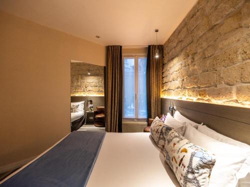 Habitación Individual Superior del hotel Minerve Paris. Foto 9