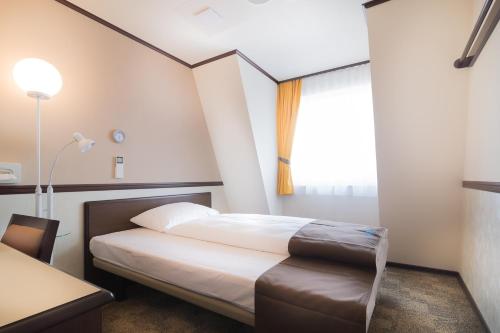 Habitación Individual del hotel Toyoko Inn Frankfurt am Main Hauptbahnhof. Foto 3