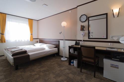 Habitación Doble adaptada para personas con movilidad reducida del hotel Toyoko Inn Frankfurt am Main Hauptbahnhof