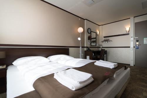 Habitación Doble adaptada para personas con movilidad reducida del hotel Toyoko Inn Frankfurt am Main Hauptbahnhof. Foto 6