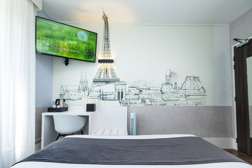 Habitación Confort del hotel De Paris Montparnasse. Foto 1