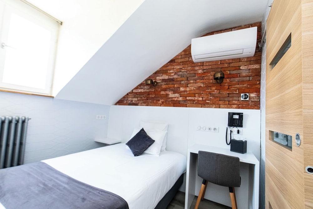 Habitación Confort del hotel De Paris Montparnasse. Foto 5
