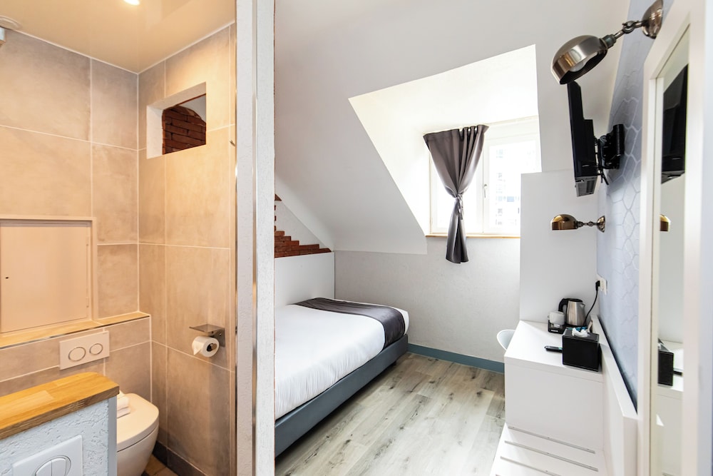 Habitación Confort del hotel De Paris Montparnasse. Foto 9
