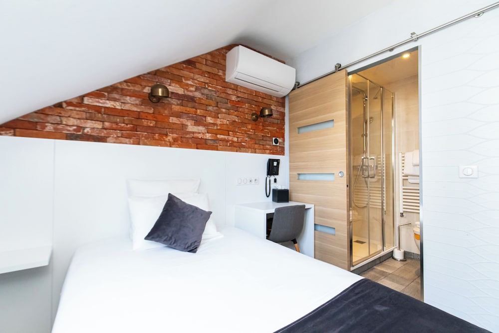 Habitación Confort del hotel De Paris Montparnasse. Foto 10
