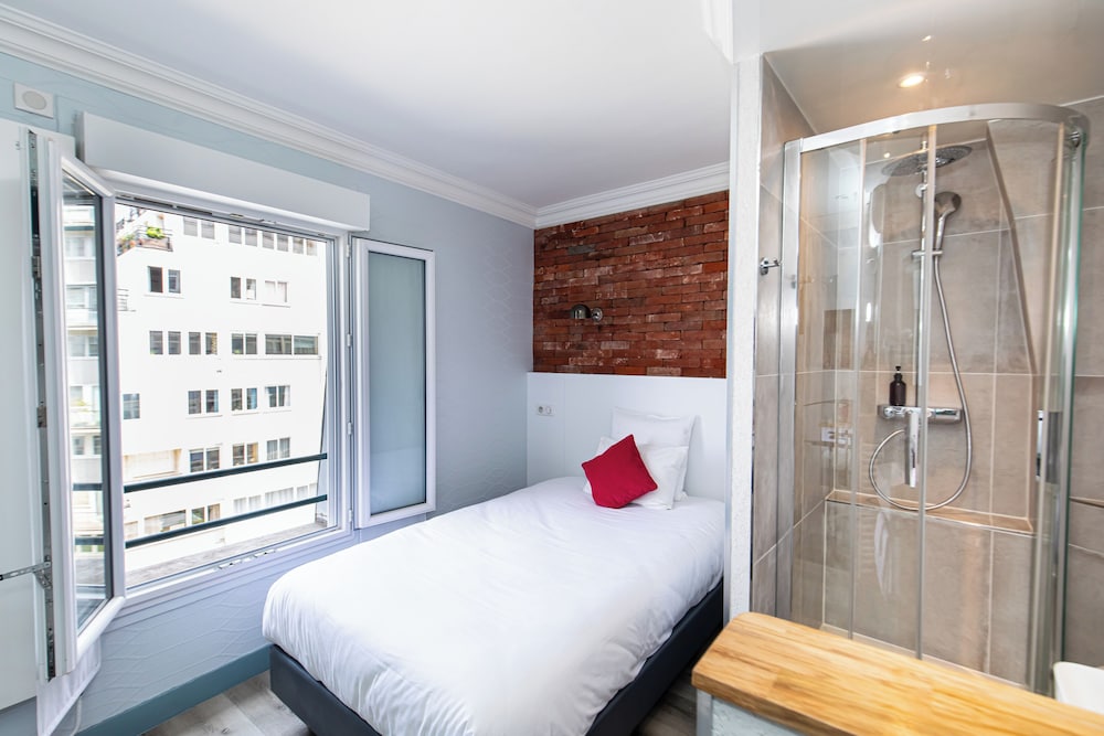 Habitación Confort del hotel De Paris Montparnasse. Foto 11