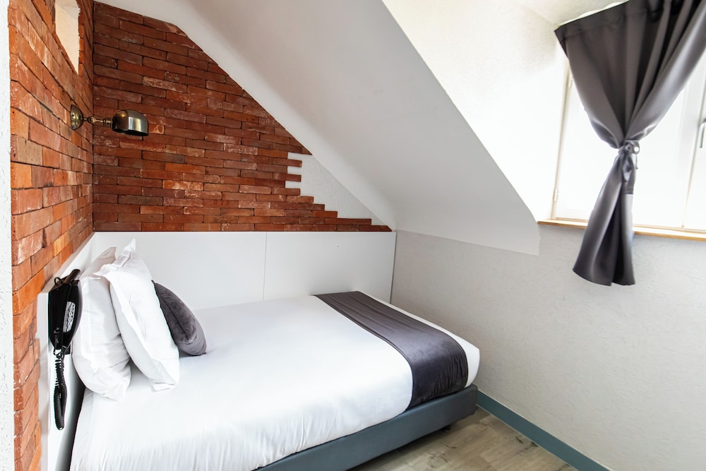 Habitación Confort del hotel De Paris Montparnasse. Foto 13