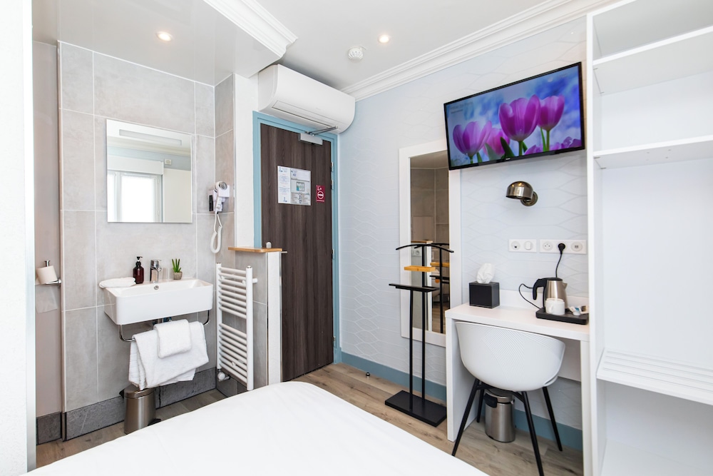 Habitación Confort del hotel De Paris Montparnasse. Foto 14