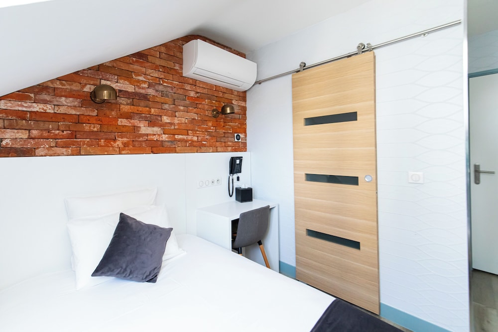 Habitación Confort del hotel De Paris Montparnasse. Foto 16