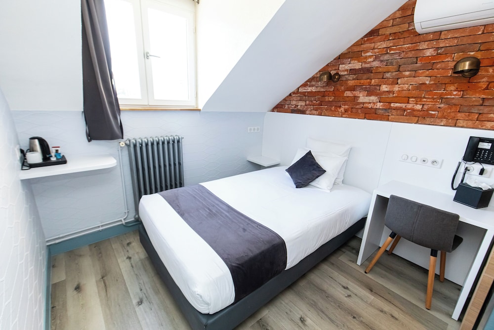 Habitación Confort del hotel De Paris Montparnasse. Foto 18