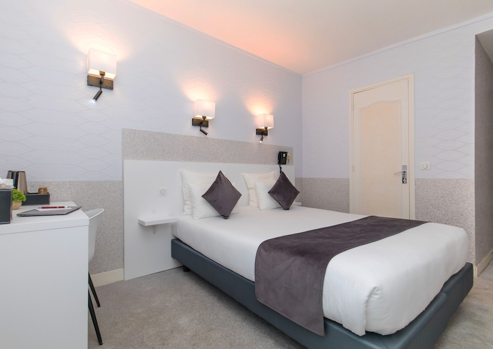 Habitación Superior del hotel De Paris Montparnasse. Foto 1