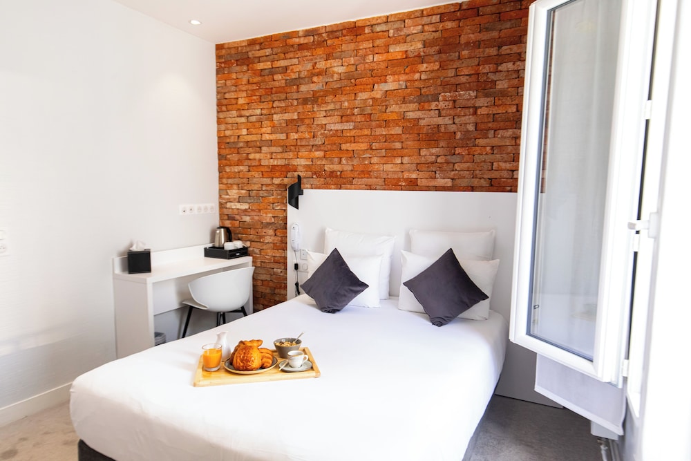 2 Chambres Adjacentes del hotel De Paris Montparnasse. Foto 5