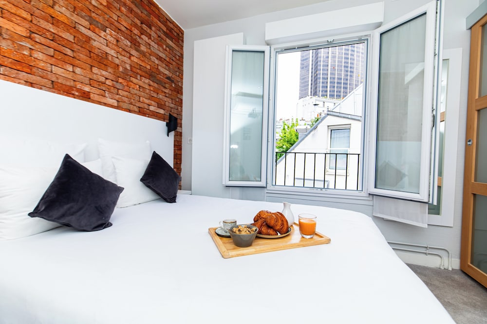 2 Chambres Adjacentes del hotel De Paris Montparnasse. Foto 7