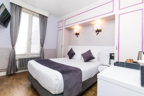 Habitación Doble del hotel De Paris Montparnasse. Foto 1