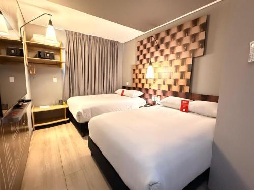 Habitación Doble Superior - 2 camas dobles del hotel Ibis Cúcuta. Foto 6