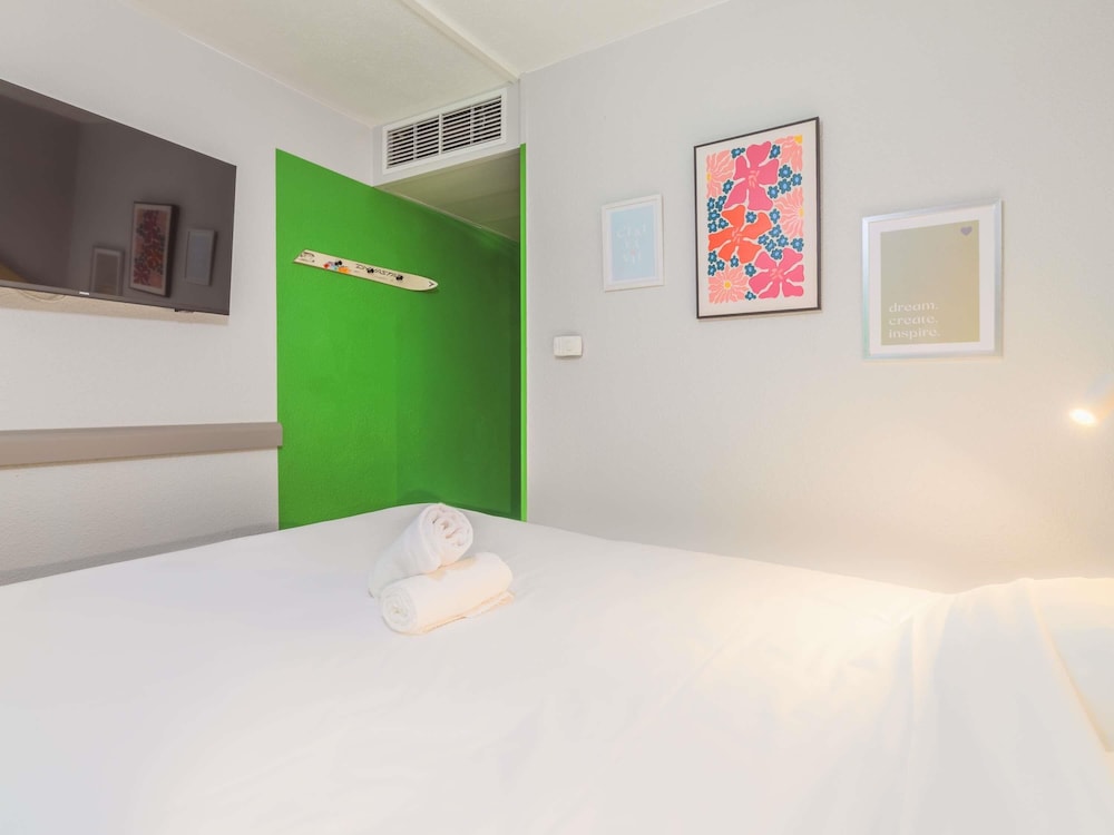 Habitación POP con vistas al jardín y 1 cama doble del hotel Greet Annecy Cran Gevrier By Accor. Foto 8