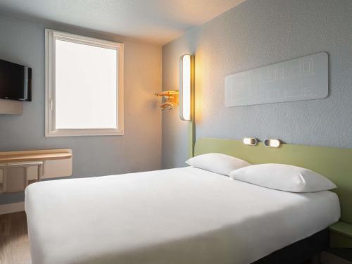 Habitación Doble del hotel Ibis Budget Paris La Villette 19eme. Foto 1