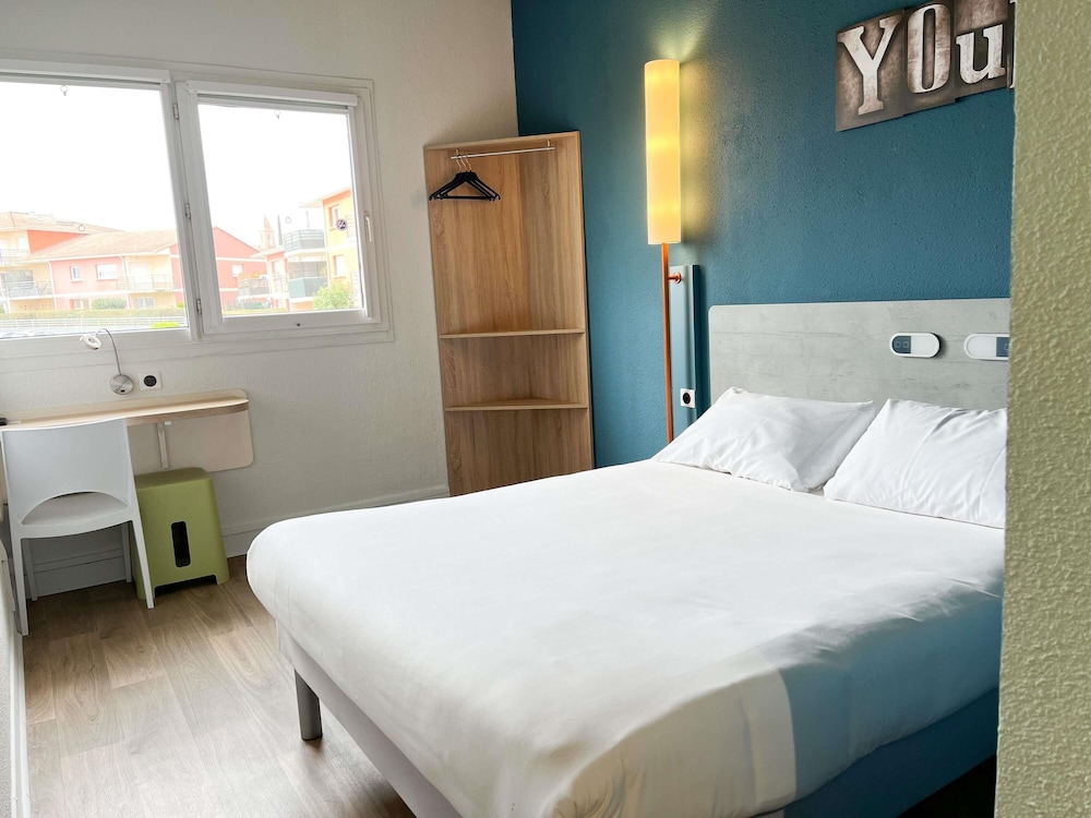 Habitación doble con 1 cama doble del hotel Ibis Budget Alès Saint Christol