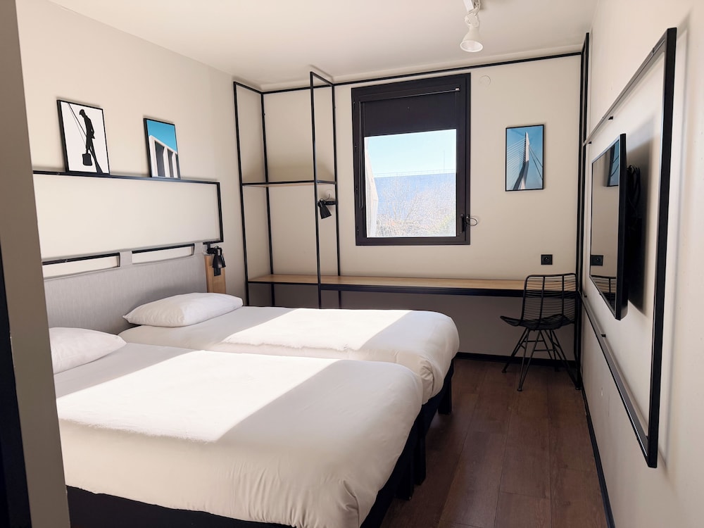 Habitación estándar con 2 camas individuales del hotel Ibis Lunel Petite Camargue. Foto 3
