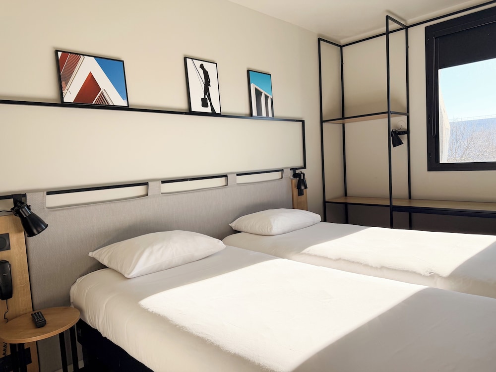 Habitación estándar con 2 camas individuales del hotel Ibis Lunel Petite Camargue. Foto 5