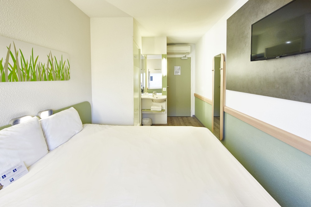 Triple - Habitación con una cama doble y una litera individual del hotel Ibis budget Haguenau Strasbourg Nord. Foto 1