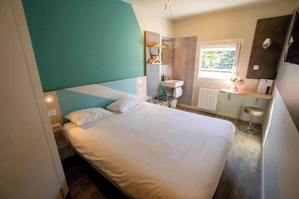 Triple - Habitación con una cama doble y una litera individual del hotel Ibis budget Haguenau Strasbourg Nord. Foto 3