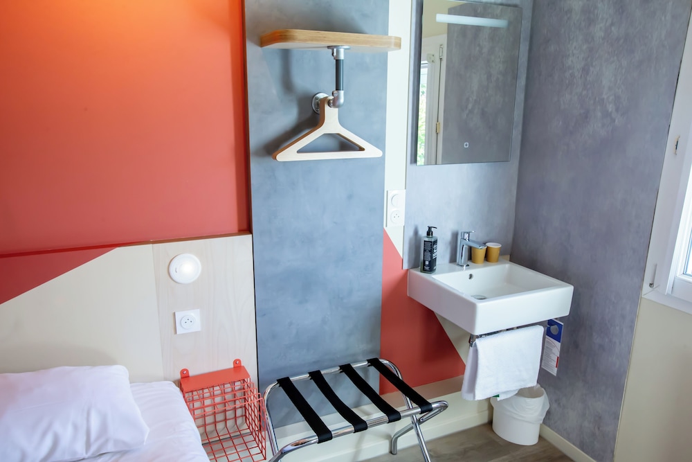 Habitación con 2 camas individuales para hasta 2 personas del hotel Ibis budget Haguenau Strasbourg Nord. Foto 1