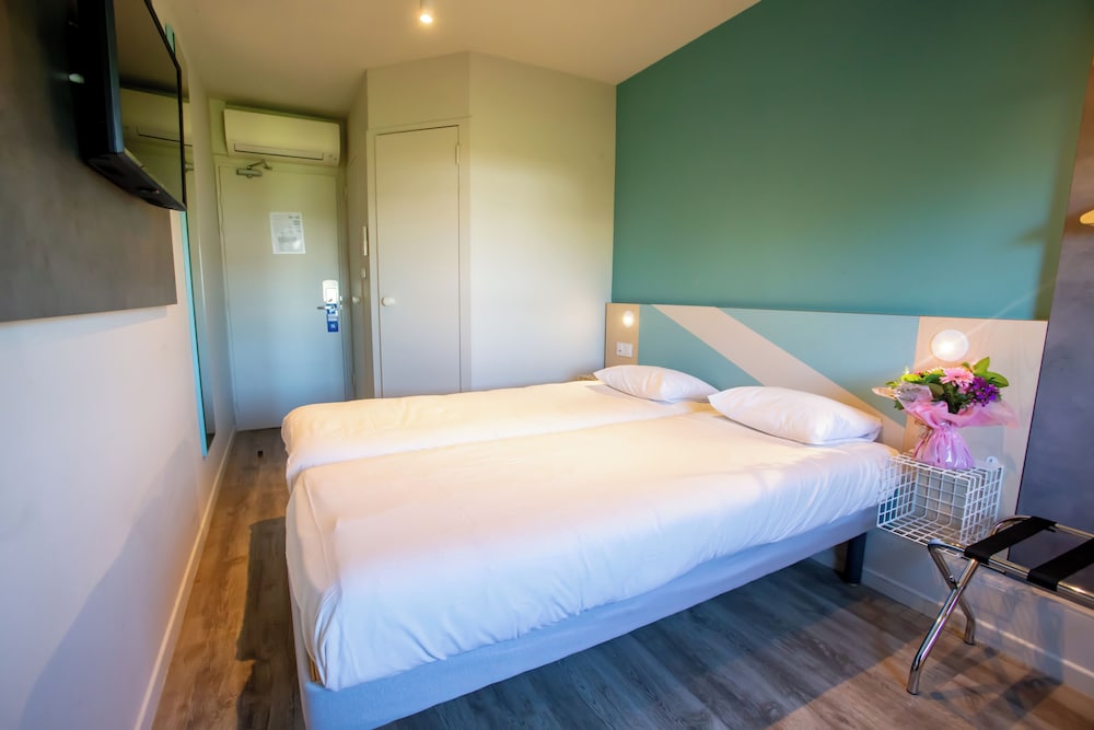Habitación con 2 camas individuales para hasta 2 personas del hotel Ibis budget Haguenau Strasbourg Nord. Foto 2