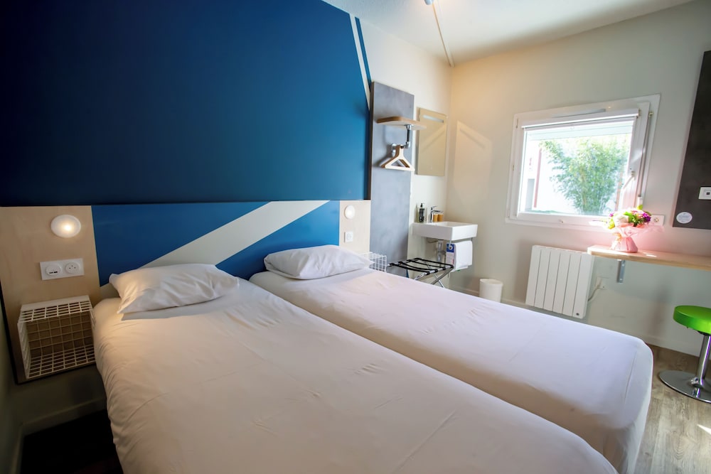 Habitación con 2 camas individuales para hasta 2 personas del hotel Ibis budget Haguenau Strasbourg Nord. Foto 4