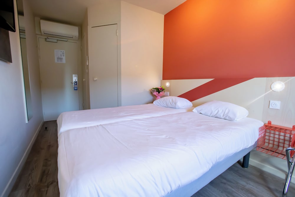 Habitación con 2 camas individuales para hasta 2 personas del hotel Ibis budget Haguenau Strasbourg Nord. Foto 6