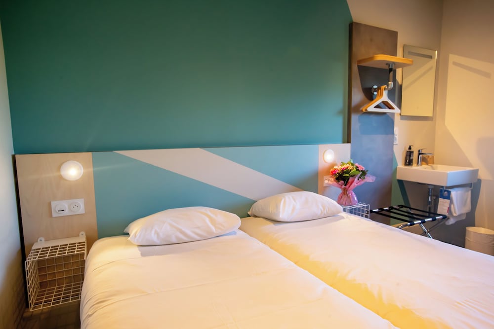 Habitación con 2 camas individuales para hasta 2 personas del hotel Ibis budget Haguenau Strasbourg Nord. Foto 7