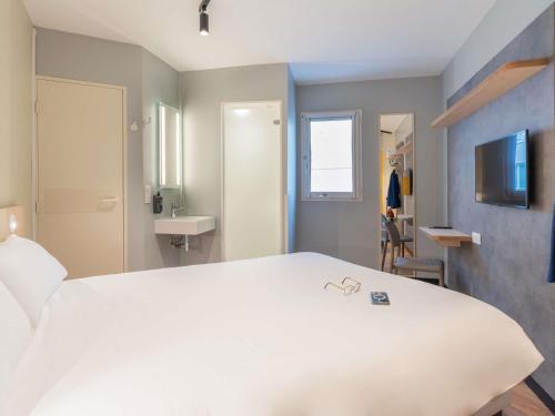 Habitación Doble Estándar del hotel ibis budget Marne la Vallée Val d'Europe. Foto 1