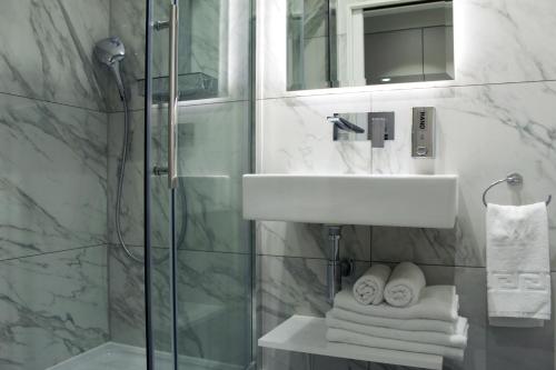 Estudio con 2 camas individuales del hotel NOX Waterloo. Foto 3