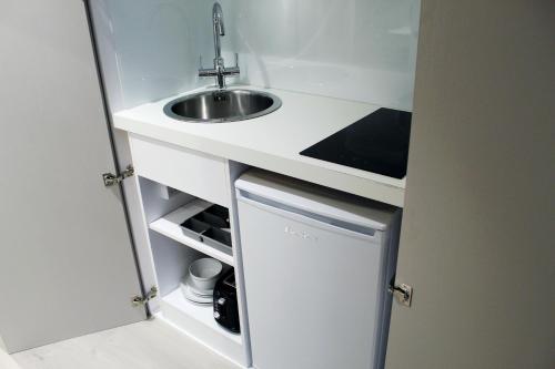 Estudio con 2 camas individuales del hotel NOX Waterloo. Foto 9