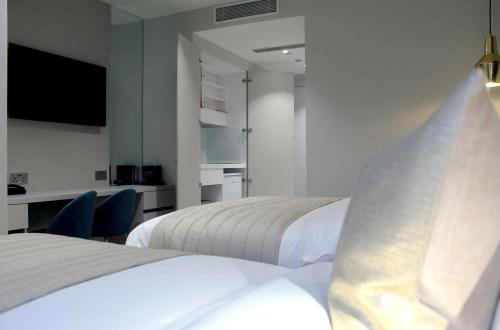 Estudio Triple del hotel NOX Waterloo. Foto 7